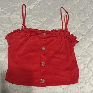 Red crop tank top .